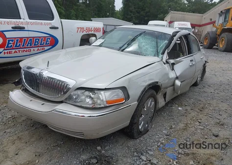 2005 Lincoln Town Car Signature Limited из США, поврежденный, VIN 1LNHM82W05Y664410